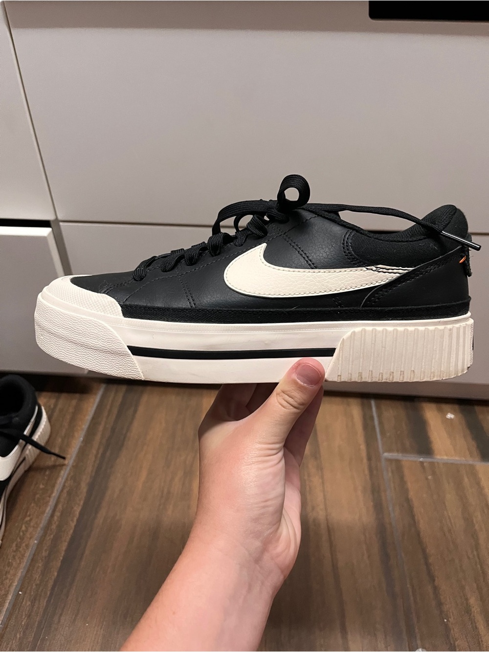 Nike Women’s Court Legacy Lift Platform Leather Sneaker in Black and White